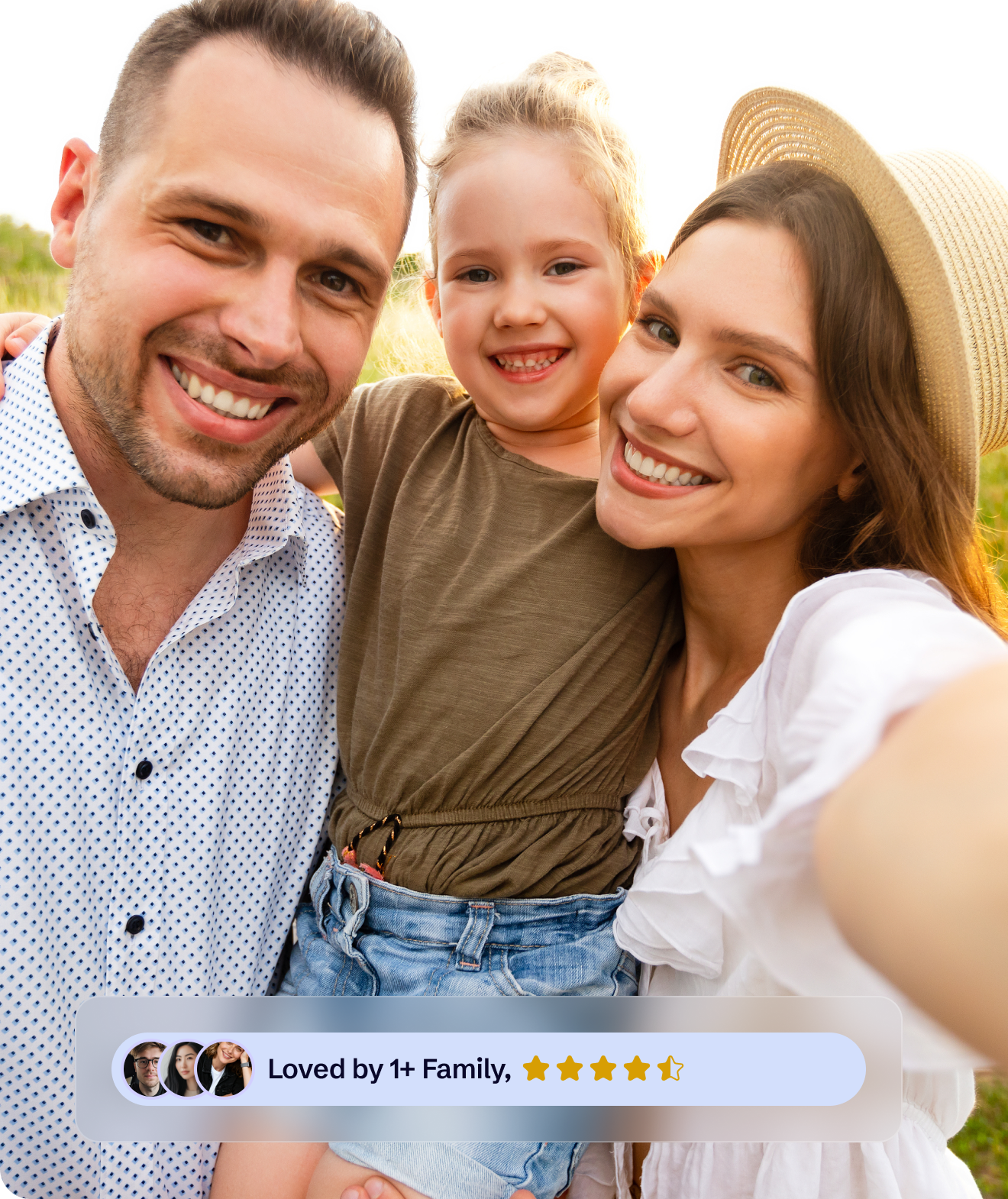 Family smiling together outdoors